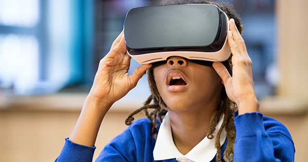girl using VR headset