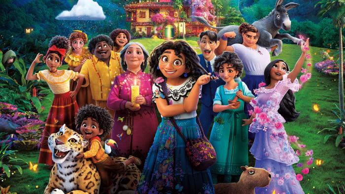 Many characters from the movie Encanto in a group, with Mirabel front and center.