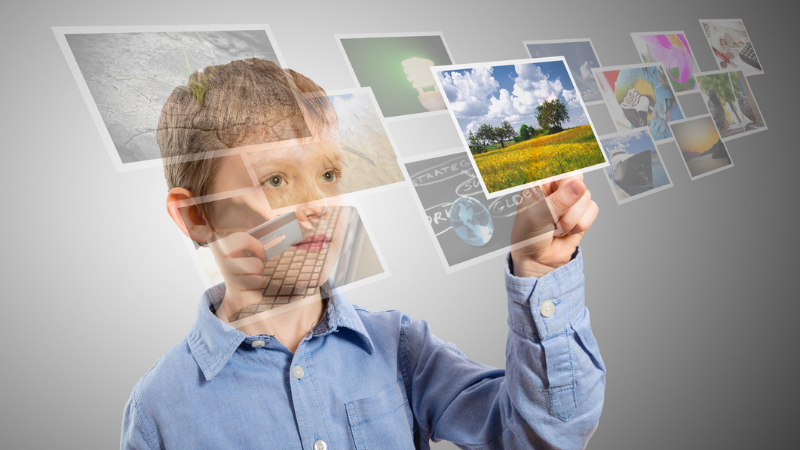 kid with images floating above him