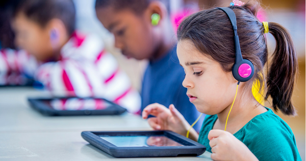 kids listening to podcasts in the classroom