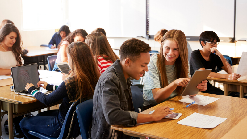 teens in the classroom collaborating