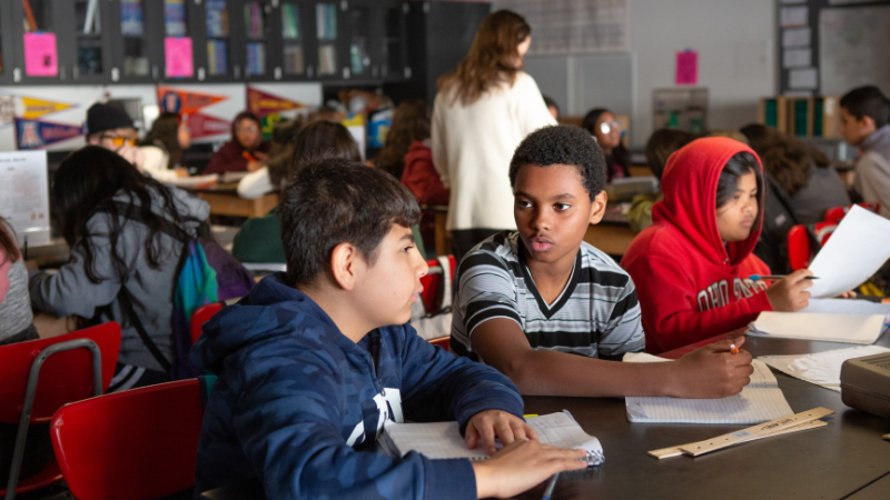 Photo of middle schoolers working together