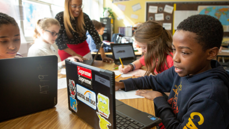 Students using computers in a classroom