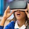 girl using VR headset